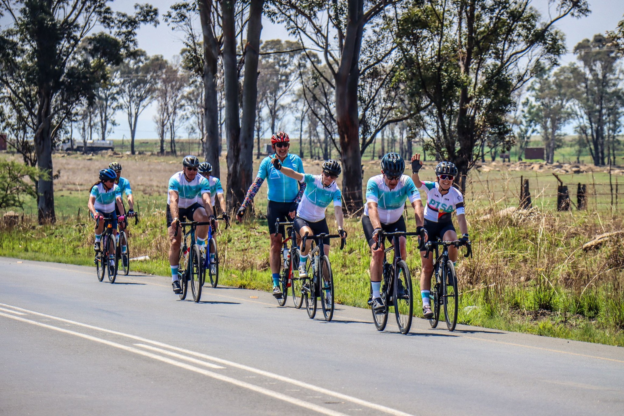 cyclist arriving at water point