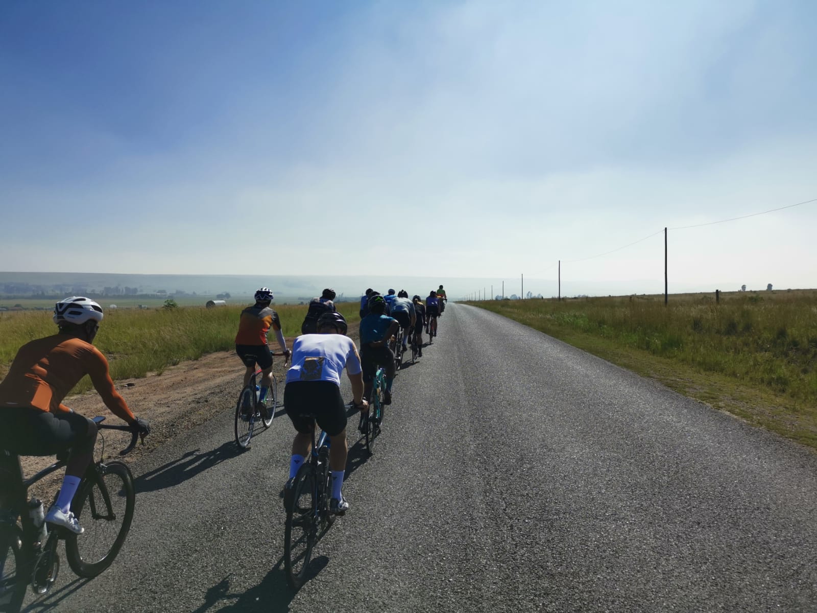 cyclists riding in group